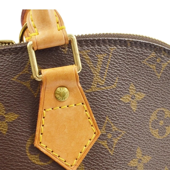 LOUIS VUITTON Alma Monogram Handbag - Picture 7 of 9